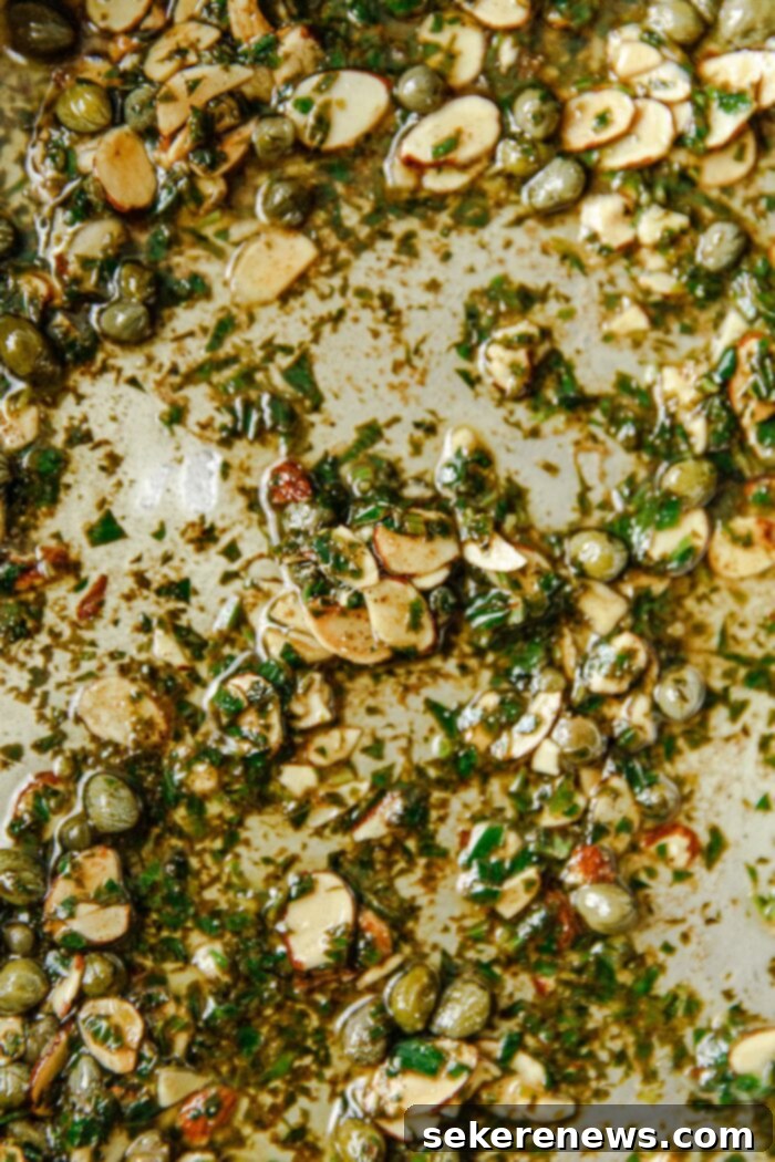 Brown Butter Almond Trout 5 The finished brown butter almondine sauce with capers and parsley, ready to be spooned over trout.