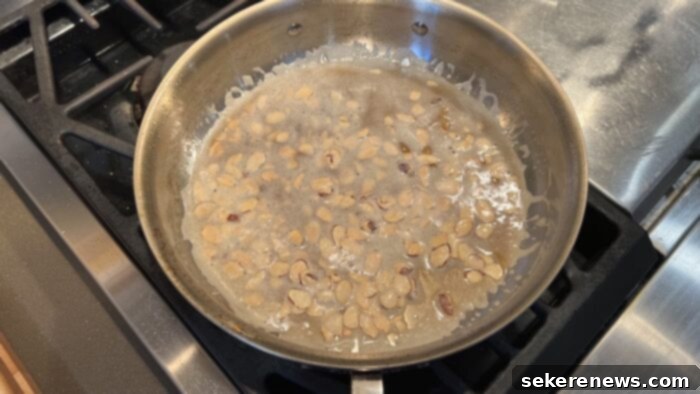 Brown Butter Almond Trout 9 Butter and almonds browning in a skillet for the Almondine sauce.