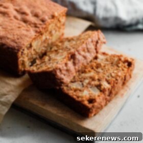 Wholesome Apple Oatmeal Quick Bread 12 Sliced Apple Quick Bread on Cutting Board