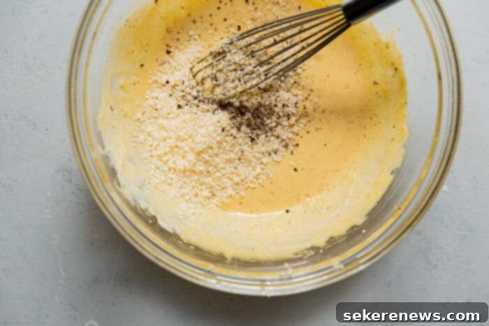 Signature Kale Caesar 10 Rich and creamy homemade Kale Caesar Salad dressing in a glass bowl.