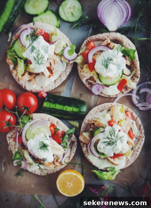Zesty Chicken Pitas with Whipped Feta & Tzatziki 2 Homemade Chicken Pitas with Jalapeño Whipped Feta and Quick Tzatziki