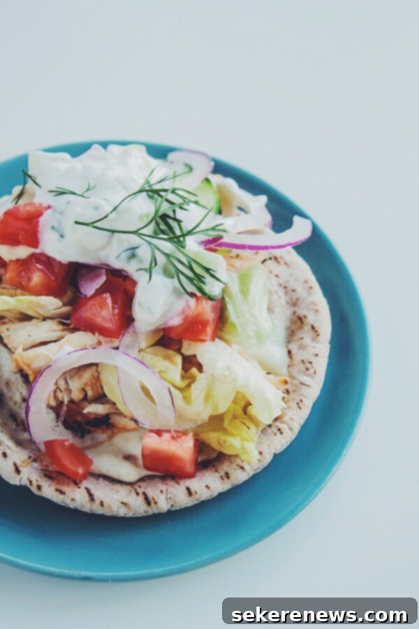 Zesty Chicken Pitas with Whipped Feta & Tzatziki 8 Homemade Chicken Pitas with Jalapeño Whipped Feta and Quick Tzatziki