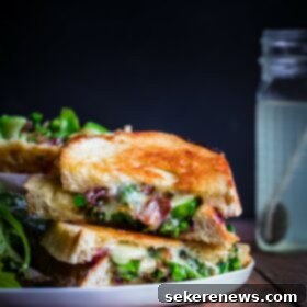 Gourmet Grilled Cheese: Melted Perfection with Caramelized Onions and Tender Broccolini 8 Grilled Cheese Sandwiches with Broccolini and Sautéed Onions