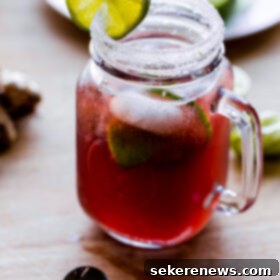 Ruby Red Moscow Mule 7 Pomegranate Moscow Mule cocktail with lime and pomegranate garnish.