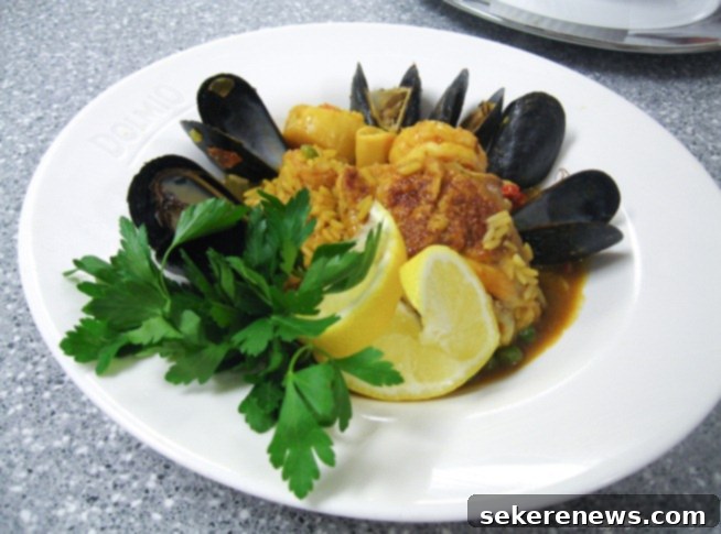 Authentic Seafood Paella with Chicken, Mussels, Shrimp, Squid, and Scallops
