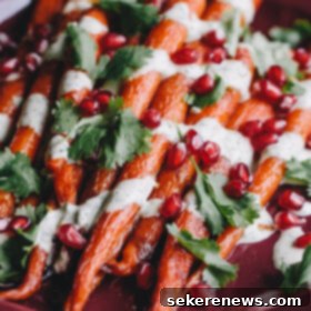 Mediterranean Roasted Carrots with Zesty Tahini and Pomegranate 7 Roasted Carrots with Green Tahini Sauce and Pomegranate, a delightful vegan side dish
