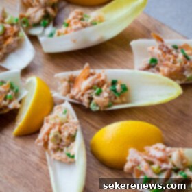 Smoked Trout atop Crisp Endive 6 Endive Spears with Smoked Trout