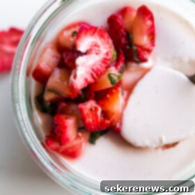 Strawberry Basil Buttermilk Panna Cotta Bliss 6 A beautifully presented Strawberry Buttermilk Panna Cotta with a fresh strawberry and basil topping.