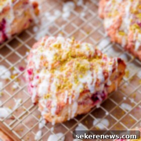 Lemon-Kissed Raspberry Pistachio Scones 7 Freshly baked Raspberry Pistachio Scones with Lemon Glaze