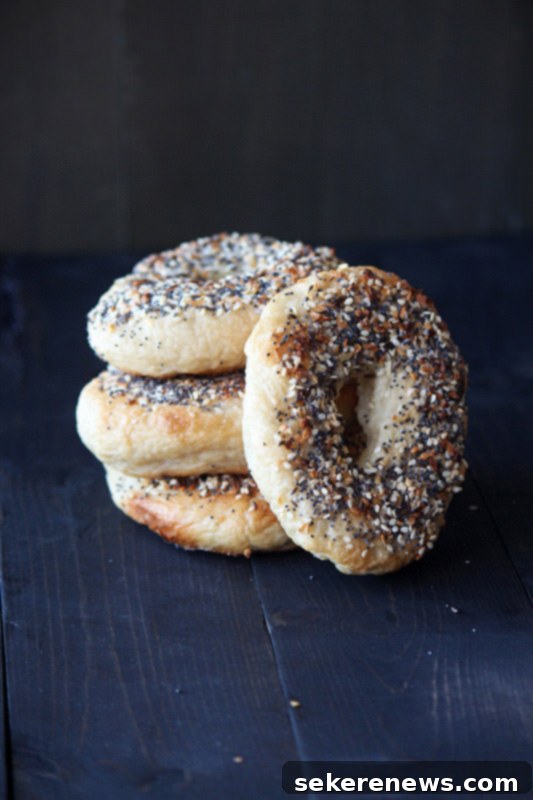 9 Everything Bagel Inspired Dishes 10 Authentic Homemade Everything Bagels, ready to be sliced and topped.
