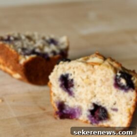Delightful Blueberry Almond Muffins 5 Simple Blueberry Almond Muffins, perfectly golden and ready to serve