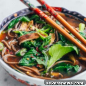 Flavorful Shiitake Spinach Miso 2 A bowl of Shiitake and Spinach Miso Soup garnished with scallions