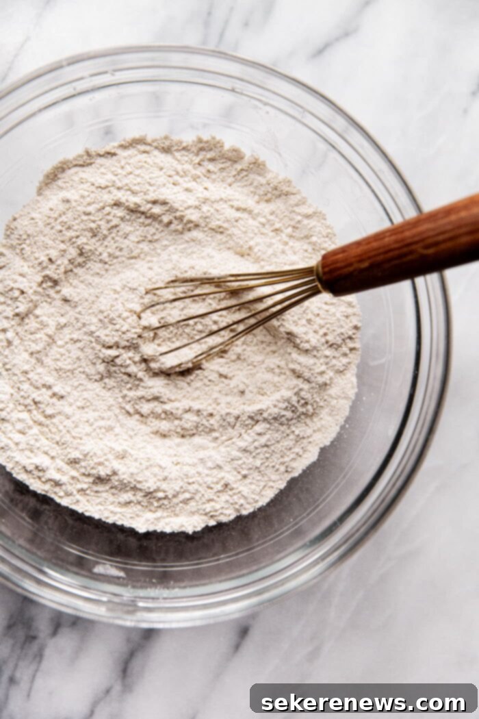 Effortless Whole Wheat Biscuits 6 Dry ingredients for whole wheat biscuits in a bowl