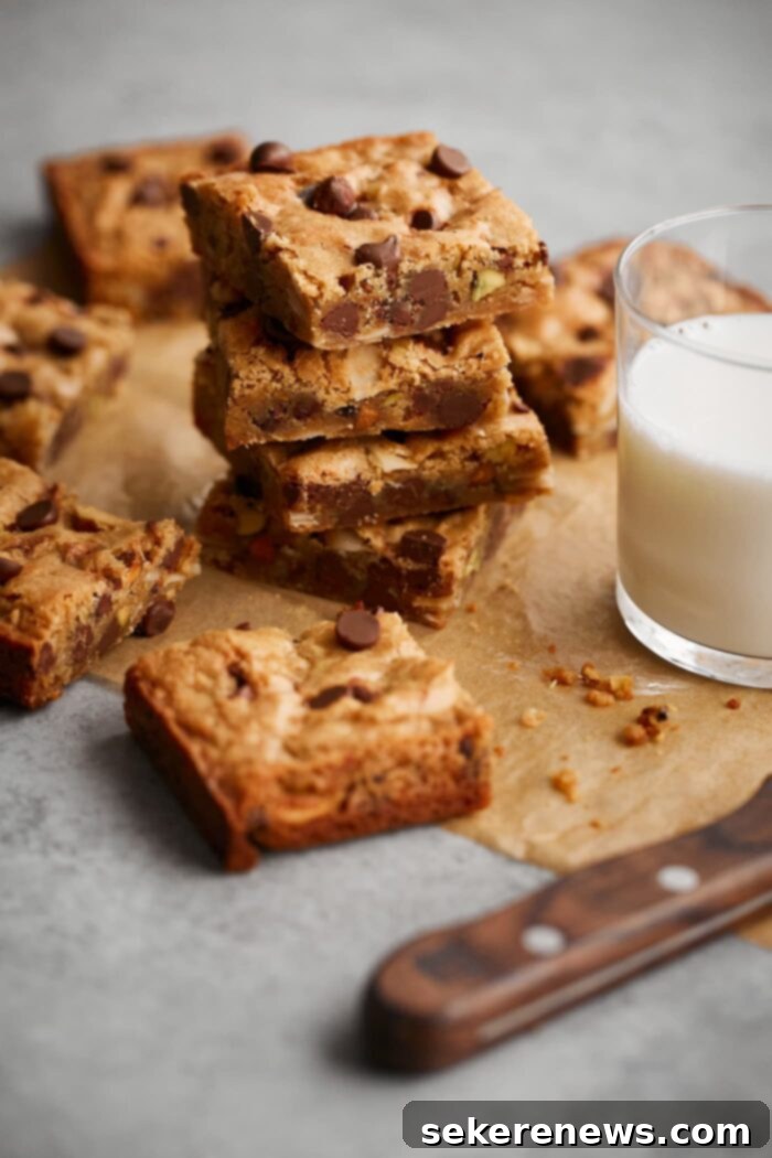 Easy Blondie Recipe and Flavor Variations 10 Stack of Blondies with Glass of Milk