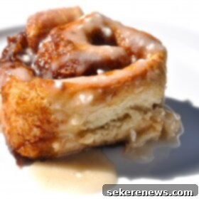 Yeastless Cinnamon Rolls 9 Close-up of a single yeast-free cinnamon roll with maple icing