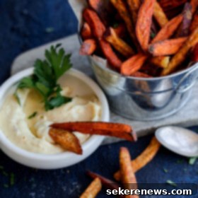 Crispy Spiced Sweet Potato Fries with Zesty Garlic Aioli 8 Crispy Baked Spiced Sweet Potato Fries with Garlic Aioli. A comforting fall appetizer or snack!