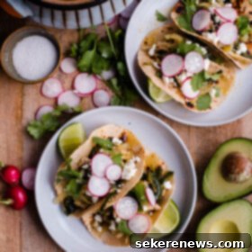 Zesty Salsa Verde Chicken Tacos 4 Salsa Verde Chicken Tacos. These easy chicken tacos are made with braised chicken thighs, poblano peppers, onions, and roasted tomatillo salsa!