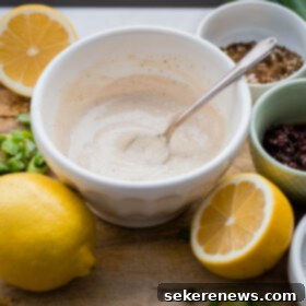 Quick Tangy Tahini Drizzle 2 EASY Lemon Tahini Sauce made with just two ingredients! Use on grilled vegetables, chicken, meat, seafood, or thin it down and use a simple salad dressing.
