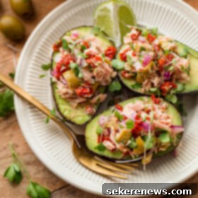 Tuna Stuffed Avocados 8 Italian Tuna Avocado Boats - fresh tuna salad made with Bella Portofino extra virgin olive oil packed yellowfin tuna, olives, sundried tomatoes, parsley, and lime served in avocado boats. An easy, healthy, dairy free, gluten free, and paleo friendly recipe!