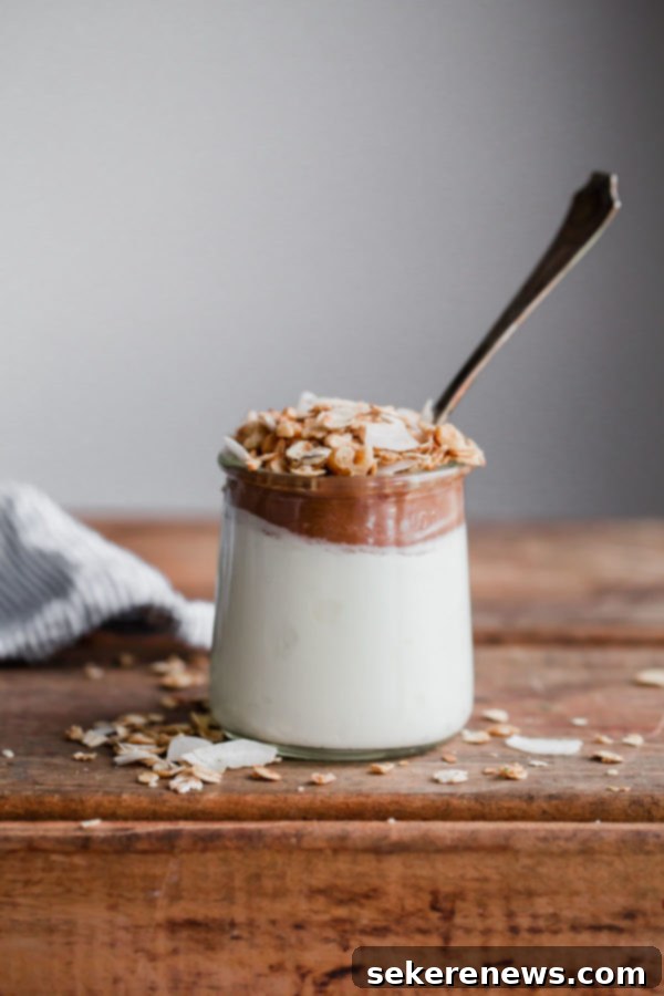 Instant Pot Apple Sauce - this EASY pressure cooker apple sauce recipe contains zero added sugar, requires zero peeling, and can be made in less than 30 minutes! Serve it with Greek yogurt and granola for a healthy breakfast. #instantpot #applesauce #apple Instant Pot Apple Sauce