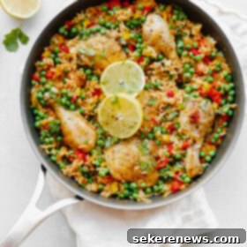 Golden Chicken and Rice 6 Arroz Con Pollo - an easy, comforting ONE pot meal that comes together in less than 45 minutes. This classic Spanish and Mexican dish is made with rice, chicken, bell peppers, and spices.