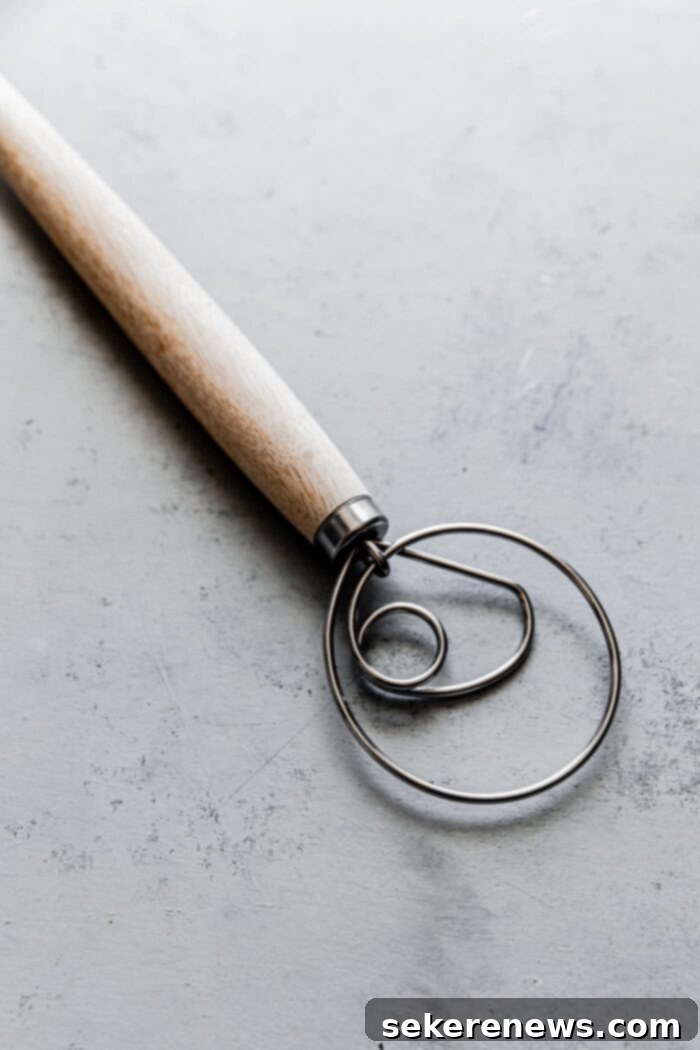 Sourdough Success: Essential Tools and Guides 14 A Danish dough whisk with a sturdy wooden handle, highly effective for mixing sticky bread dough