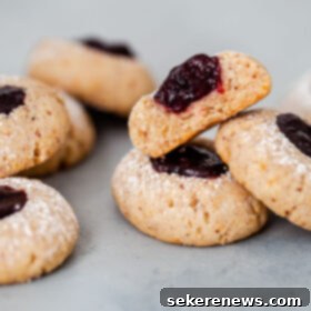 Jam-Kissed Hazelnut Thumbprint Cookies 2 Hazelnut Thumbprint Cookies with Jam
