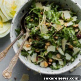 Elegant Fennel Arugula Salad with Toasted Hazelnuts, Parmesan, and Sherry Dressing 4 Shaved Fennel Arugula Salad with Hazelnuts, Parmesan, and Sherry Vinaigrette