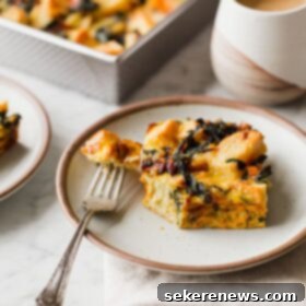 Make-Ahead Vegetarian Breakfast Bake 6 Breakfast Strata on Plate with Fork