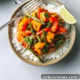 Thai Red Curry Tofu 4 Bowl with Tofu Thai Red Curry and Fork