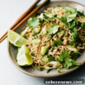 Spicy Peanut Noodles with Cooling Cucumber 10 Spicy Peanut Noodles on Plate with Chopsticks