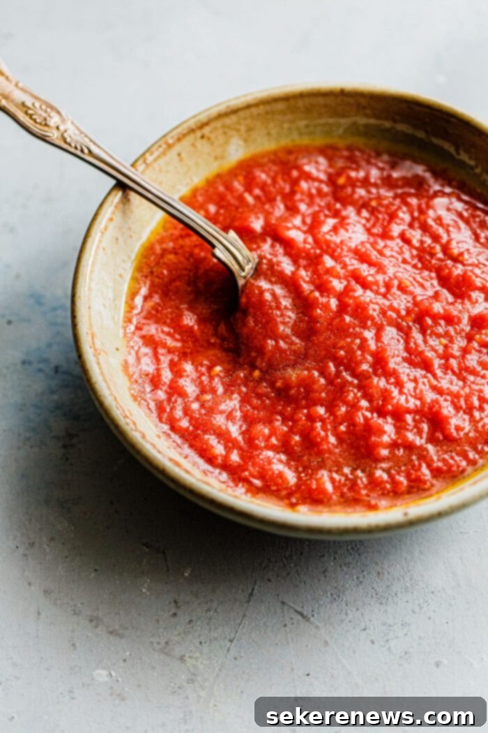Perfect Homemade Pizza Sauce 2 Homemade Pizza Sauce in Bowl with Spoon