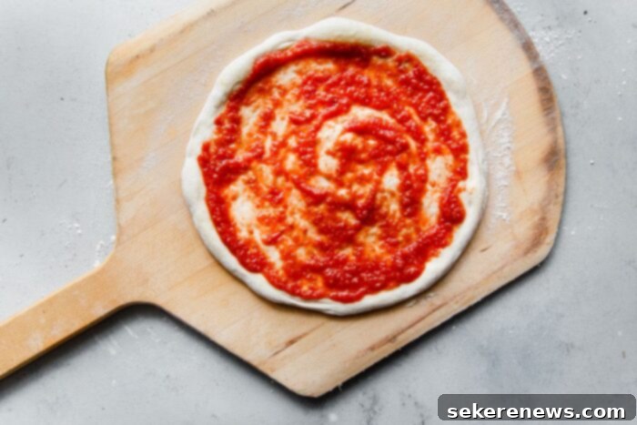 Perfect Homemade Pizza Sauce 8 Homemade Pizza Sauce Spread on Pizza Dough on a Pizza Peel