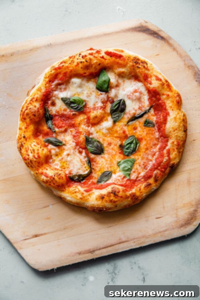 Perfect Sourdough Pizza Dough 2 Homemade Sourdough Pizza - A step-by-step guide on how to make sourdough pizza dough, including a recipe for classic Margherita-style pizzas.