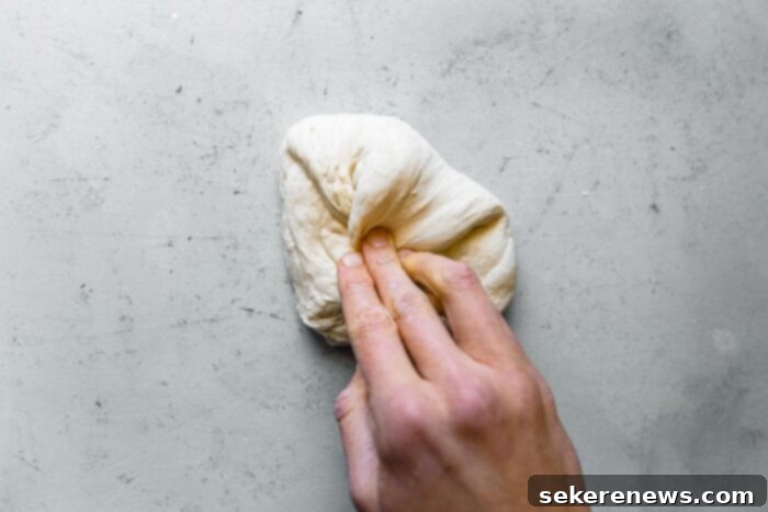 Perfect Sourdough Pizza Dough 13 Shaping Pizza Dough into Rounds