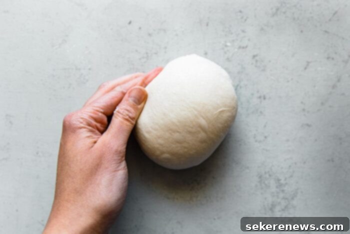 Perfect Sourdough Pizza Dough 14 Shaping Pizza Dough into Rounds