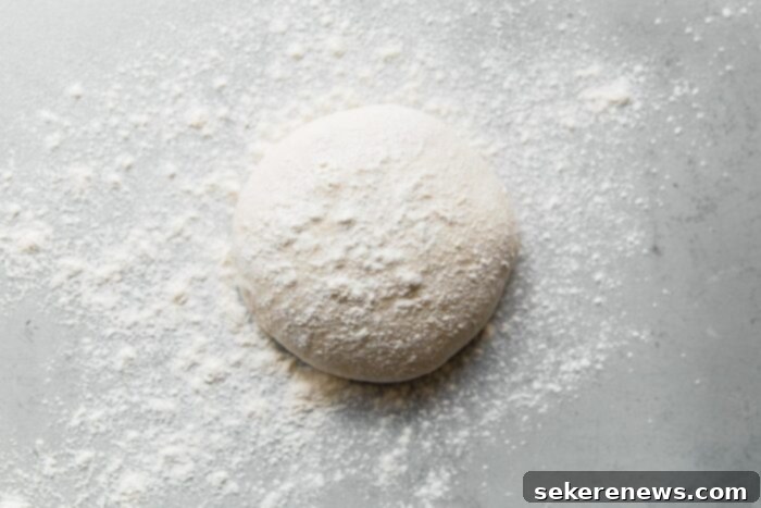 Perfect Sourdough Pizza Dough 21 Sourdough Pizza Dough Ball Dusted with Flour