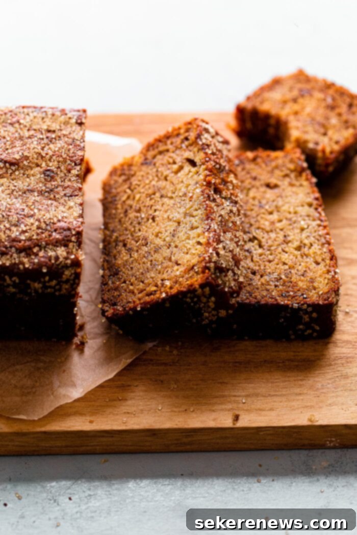 Ultimate Moist Banana Bread 2 Perfectly Sliced Moist Banana Bread with Crunchy Turbinado Sugar Topping