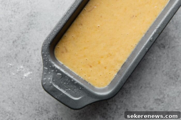 Ultimate Moist Banana Bread 9 Banana Bread Batter Poured into a Loaf Pan