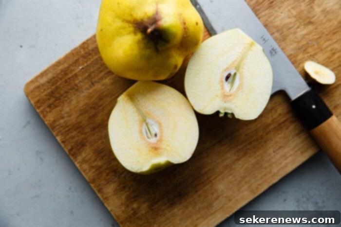 Golden Poached Quince 4 Cut Quince on Cutting Board