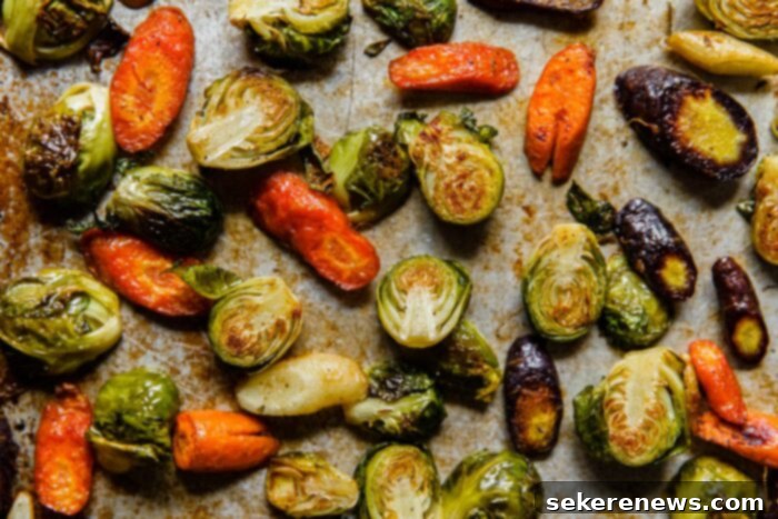 Hearty Autumn Farro Salad 5 Close-up shot of perfectly roasted Brussels sprouts and carrots, showing their caramelized edges and tender centers.