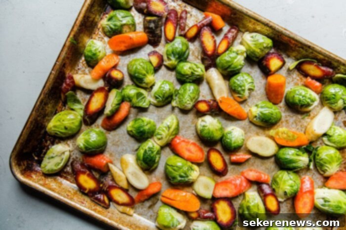 Hearty Autumn Farro Salad 7 Brussels sprouts and Carrots on Sheet Pan, showing golden-brown caramelization from roasting.
