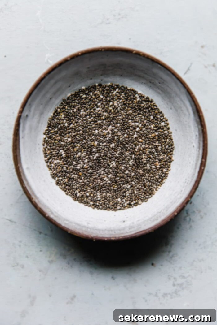Effortless Overnight Chia Delight 5 Chia seeds in bowl - Close up of white and black chia seeds