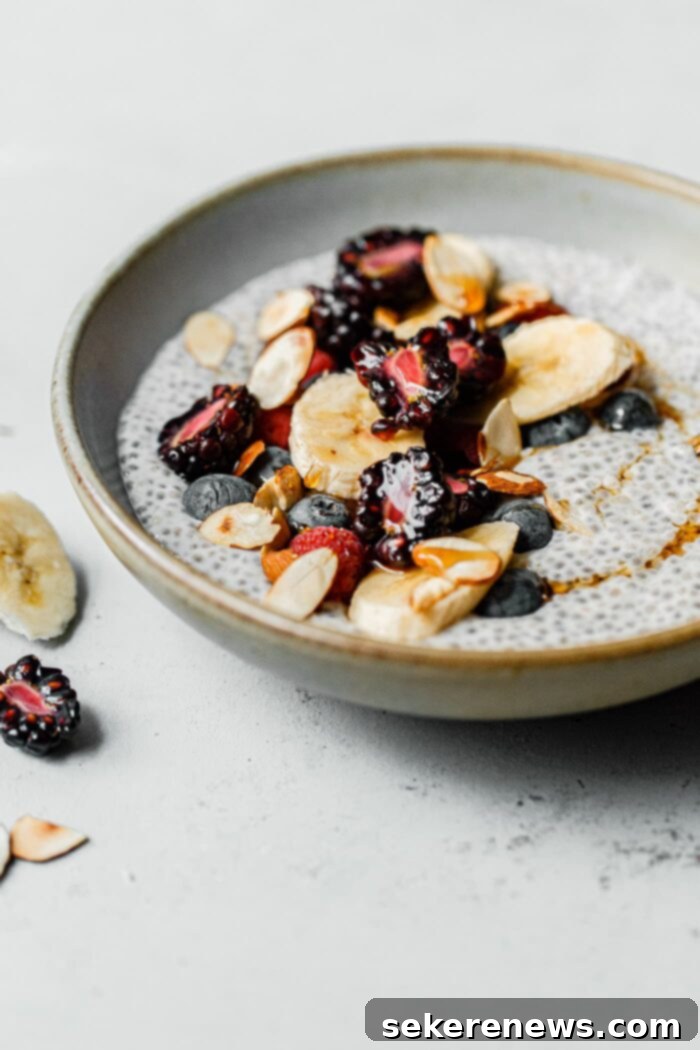 Effortless Overnight Chia Delight 8 Easy Chia Pudding with Berries - A finished bowl of chia pudding topped with fresh fruit and nuts