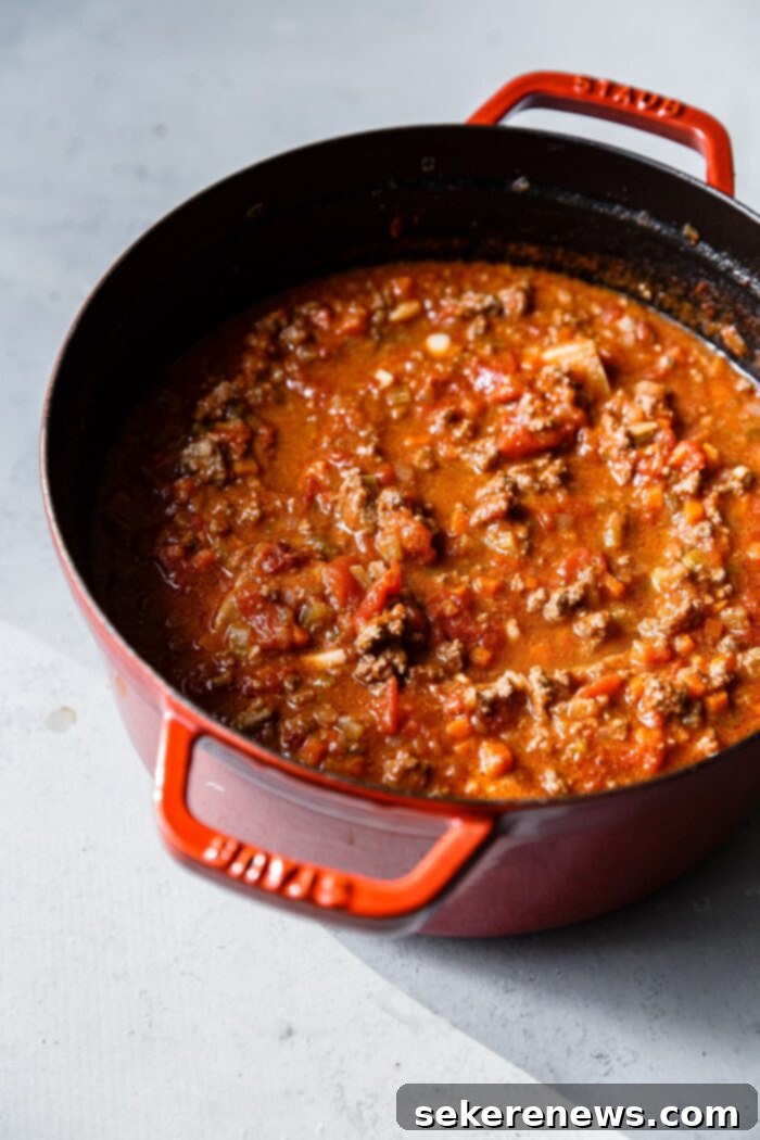 Marcella Hazan's Classic Bolognese 3 Fresh ingredients for Marcella Hazan Bolognese sauce including ground beef, vegetables, milk, and wine