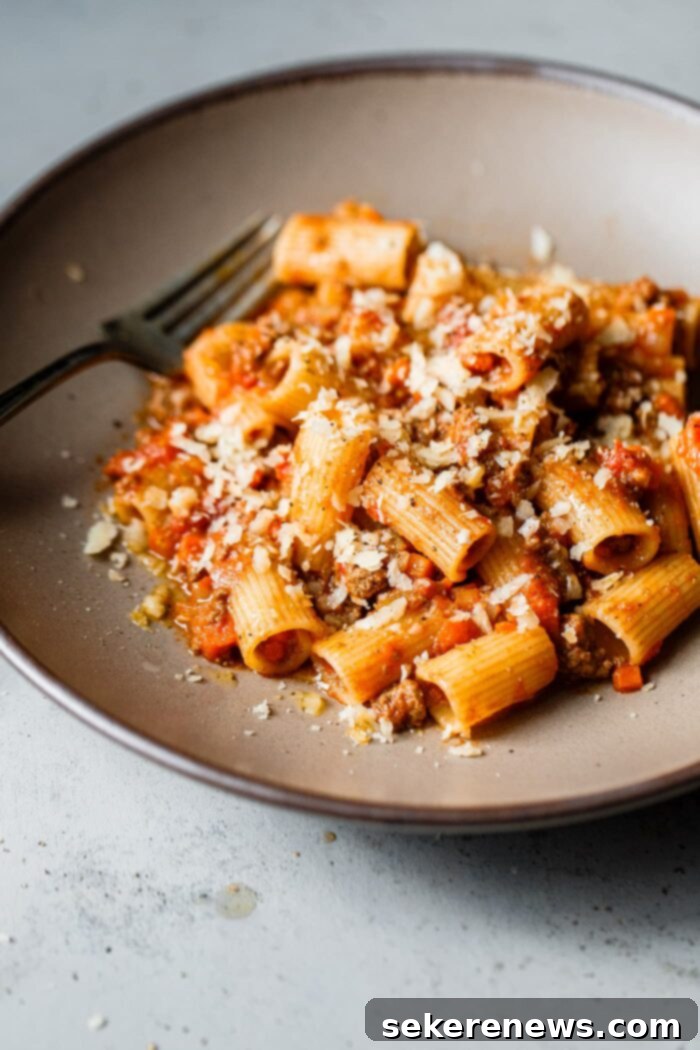 Marcella Hazan's Classic Bolognese 9 Marcella Hazan Bolognese sauce served with rigatoni pasta and fresh Parmesan
