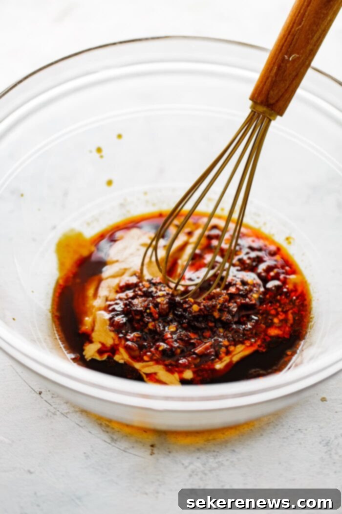 Spicy Chili Peanut Tofu Crunch 3 Spicy Chili Crisp Sauce in a bowl