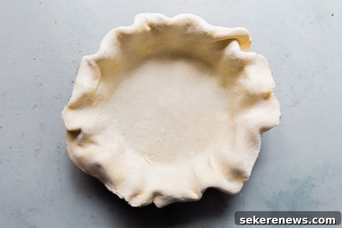 The Ultimate Flaky Quiche Pastry 6 Assembling Homemade Quiche Crust in a Pie Pan