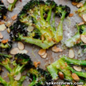 Ultimate Roasted Broccoli 6 The Best Roasted Broccoli with Toasted Almonds, Lemon, and Pecorino Cheese recipe card image.